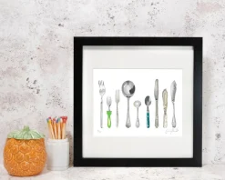 Corinne Alexander A Handful of Cutlery Framed Print by